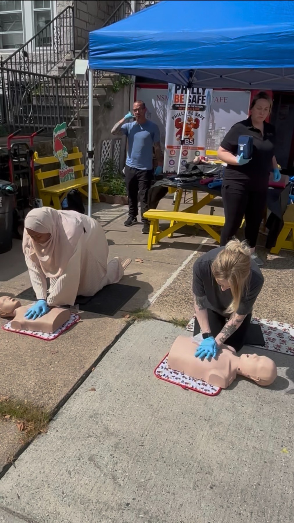 Participants practicing CPR during a community training