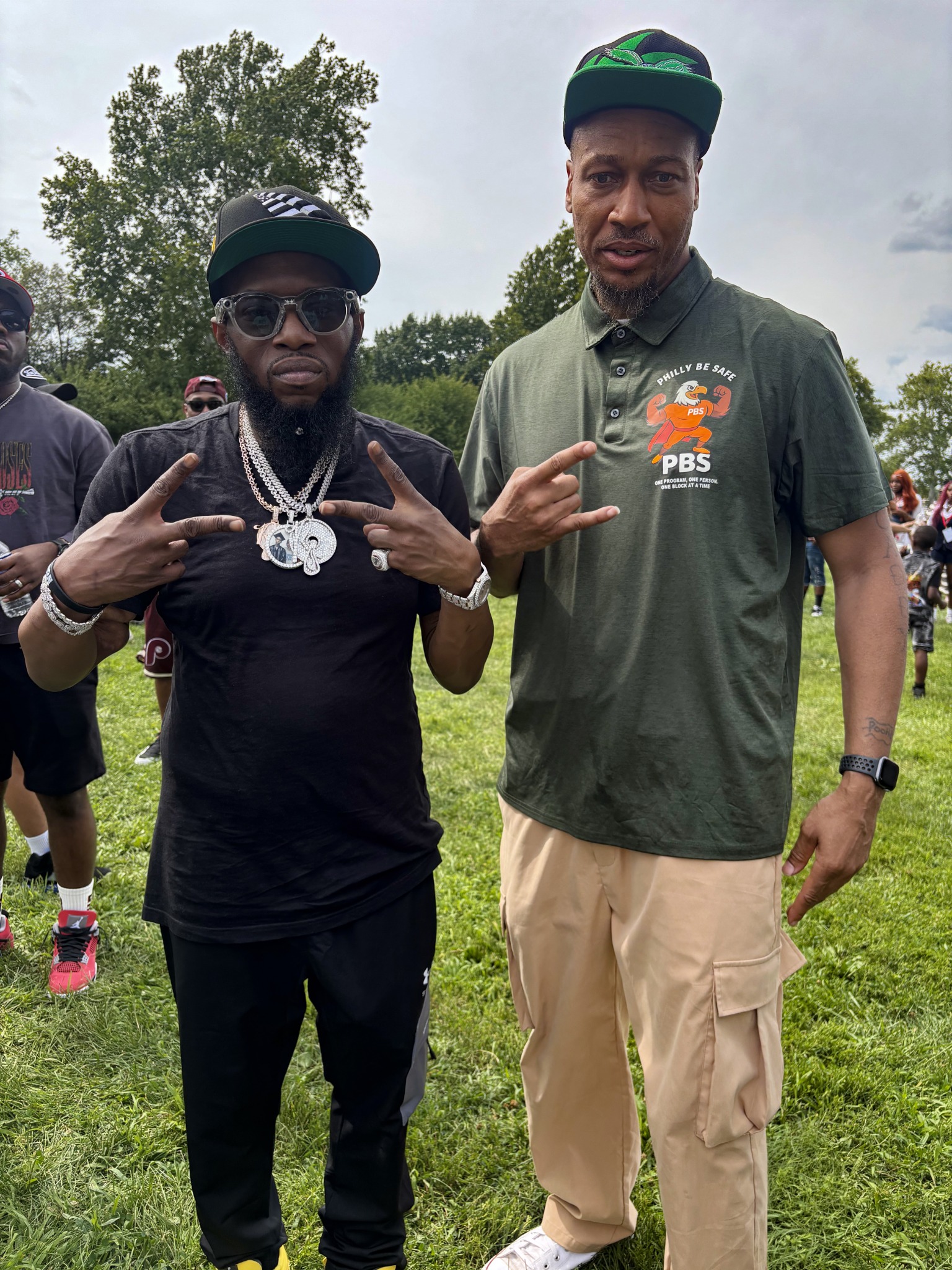 Dion Deans with a community participant at a Philly Be Safe event